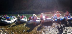 Getting ready to launch on the river while whitewater rafting on the Rogue River in Oregon with ARTA river trips