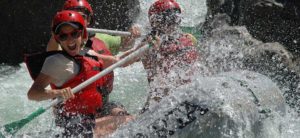 Picture of Group Hitting Rapids - Toulumne White Water Rafting Near Yosemite, ARTA River Trips