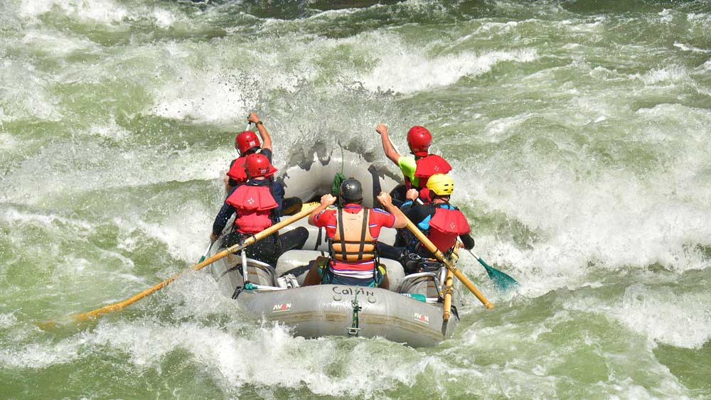 an oar-paddle raft whitewater rafting on the Merced River in California with ARTA river trips