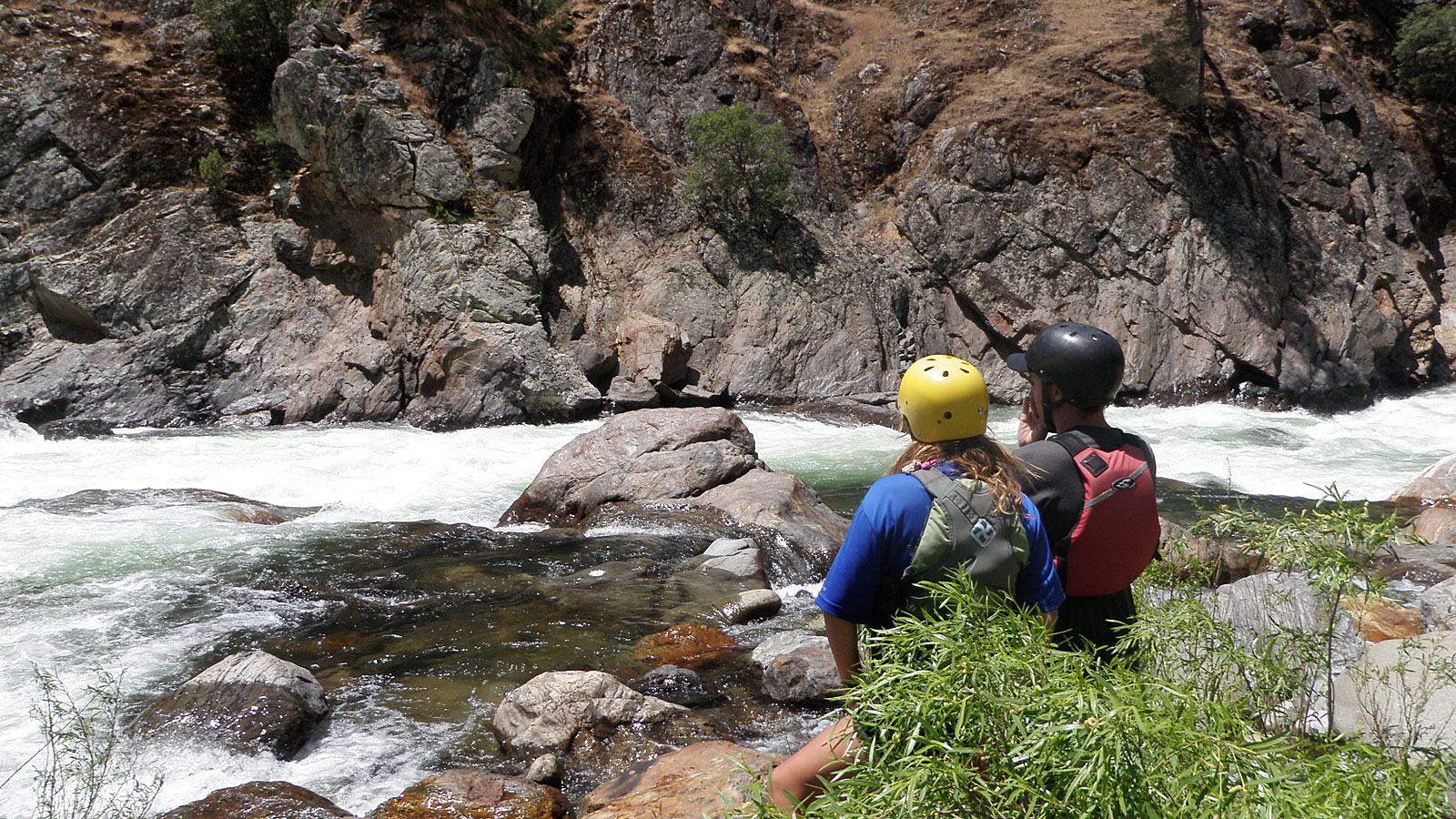 Pro guide students scout Clavey Falls on the Tuolumne River near Yosemite
