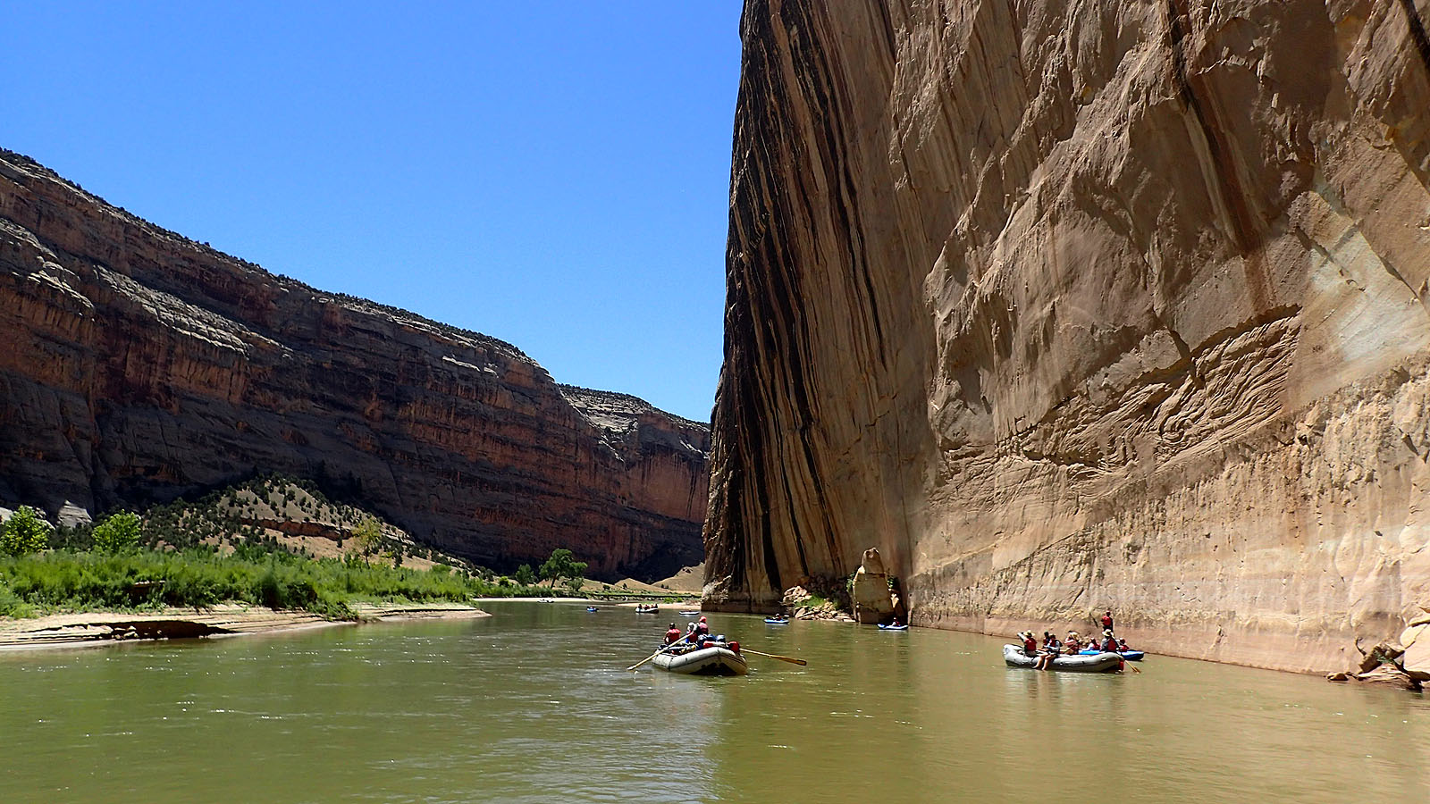 floating past Steamboat Rock on the Green River in Dinosaur National Monument