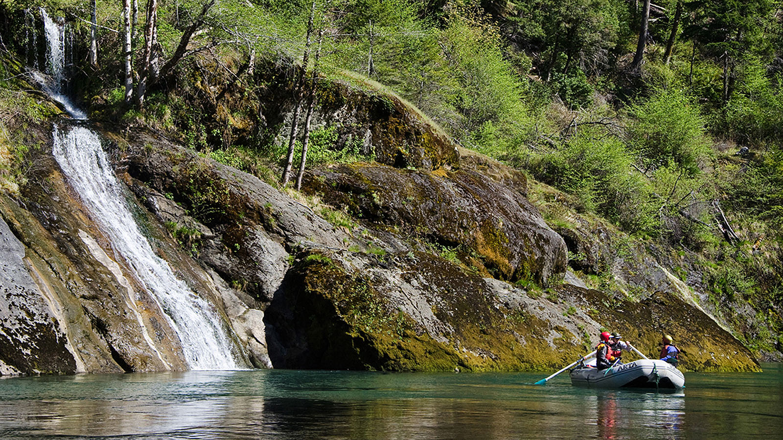 A raft and waterfall on the Illinois River in Southern Oregon