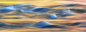 A scenic long-exposure image of the river in the evening