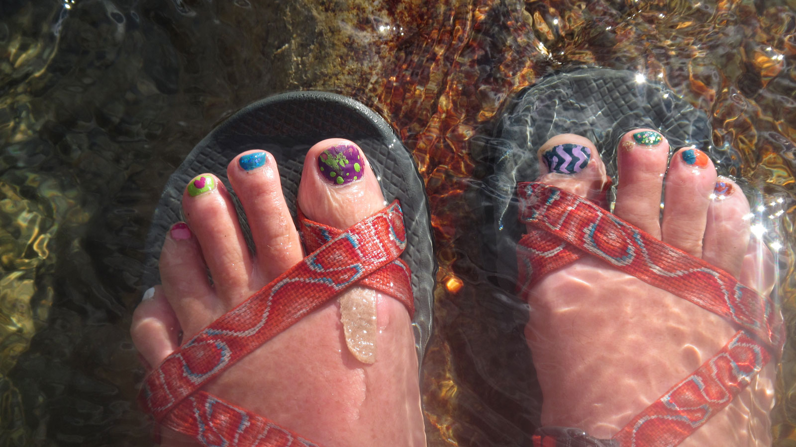 painted toenail and sandals arta river trips