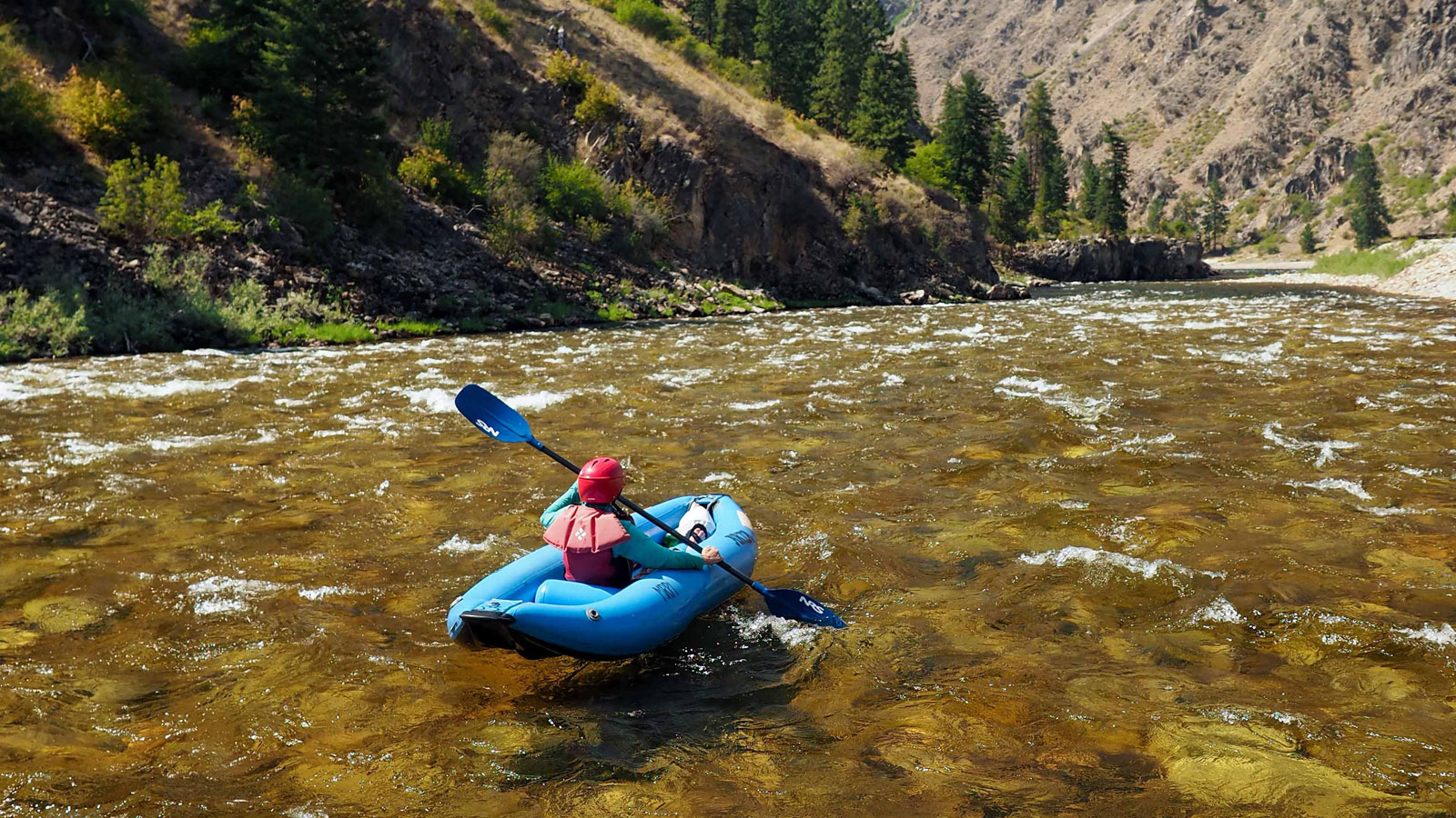 An inflatable kayak on the Main Salmon in Idaho with ARTA River Trips