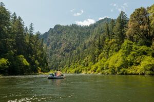 A raft navigates down the scenic rogue river