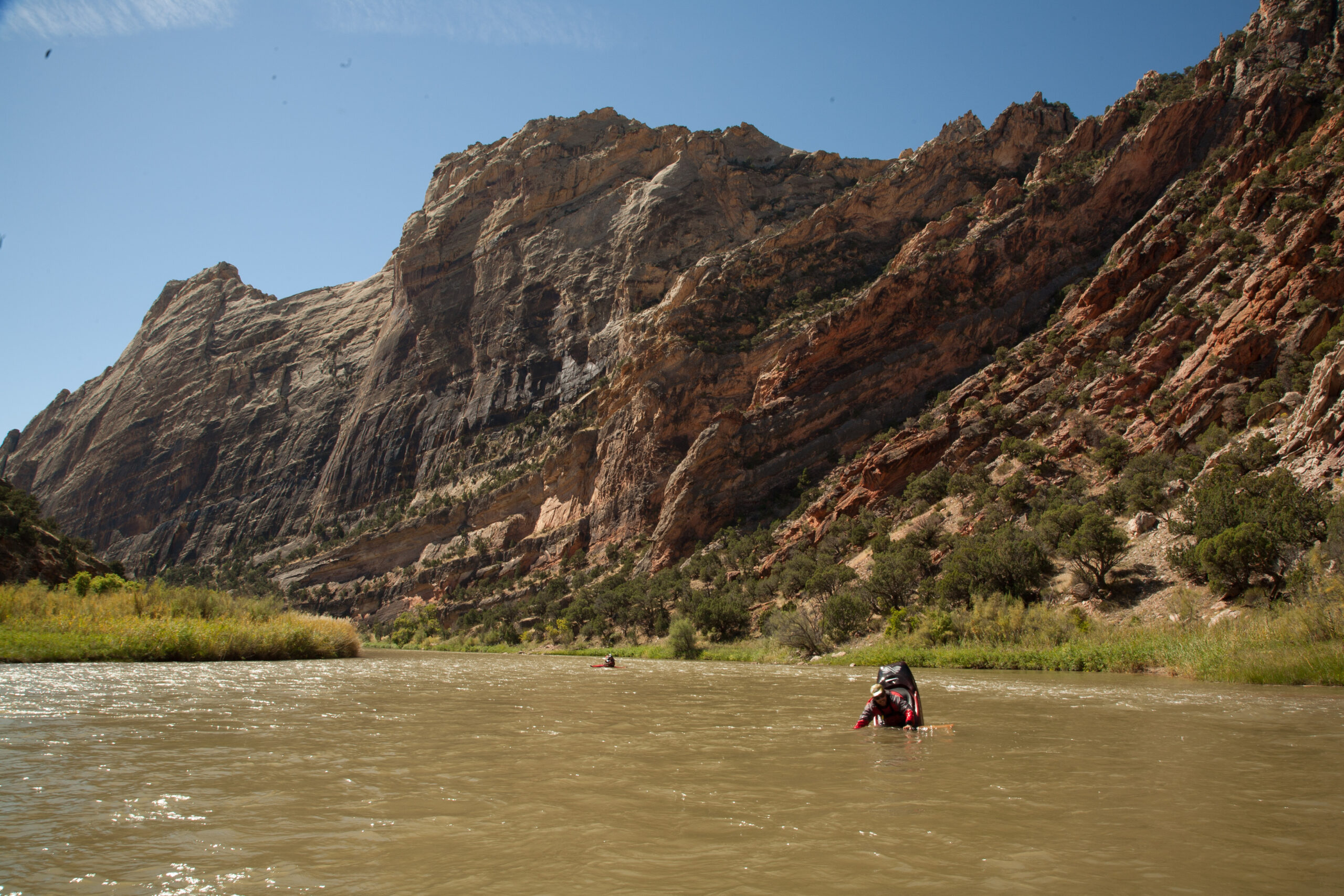 A group of rafters float down the gate of lodore in colorado