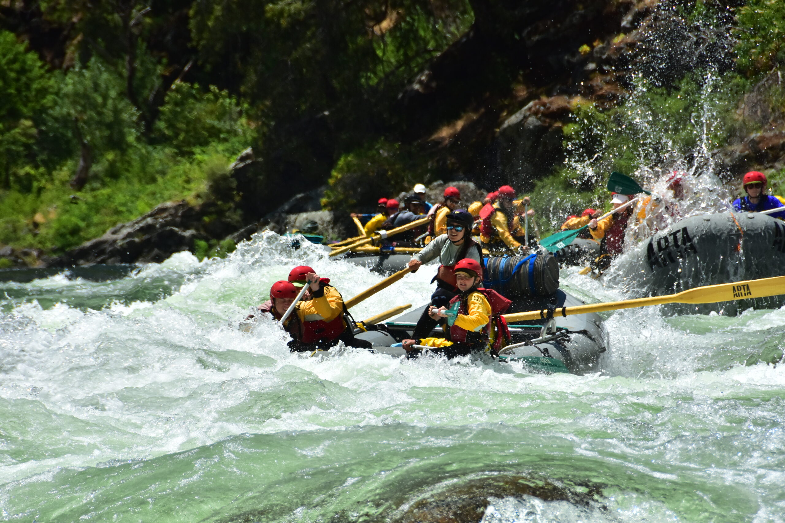 a boat rafts through rapids